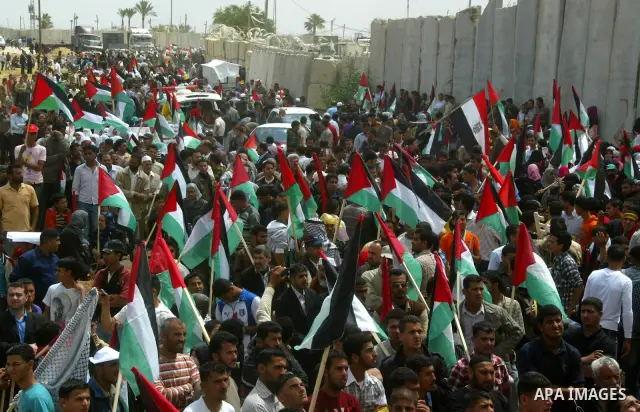Palestinians rally along the Rafah border terminal between Egypt and the southern Gaza Strip, on May 15, 2011, during a gathering to mark the 63th anniversary of the "Nakba" (catastrophe). Nakba means "catastrophe" in re...