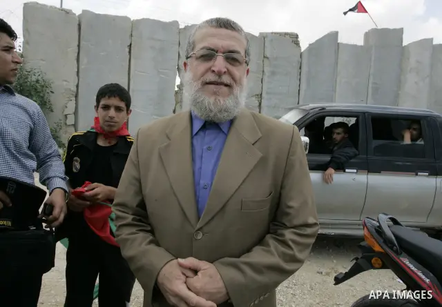Palestinian Senior Jihad Islamic leader, Nafez Azzam participates in a rally along the Rafah border terminal between Egypt and the southern Gaza Strip, on May 15, 2011, during a gathering to mark the 63th anniversary of...