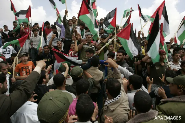 Palestinians rally along the Rafah border terminal between Egypt and the southern Gaza Strip, on May 15, 2011, during a gathering to mark the 63th anniversary of the "Nakba" (catastrophe). Nakba means "catastrophe" in re...