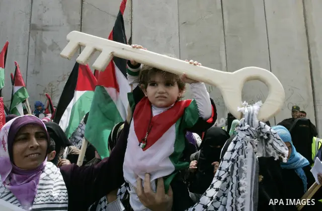 Palestinians rally along the Rafah border terminal between Egypt and the southern Gaza Strip, on May 15, 2011, during a gathering to mark the 63th anniversary of the "Nakba" (catastrophe). Nakba means "catastrophe" in re...