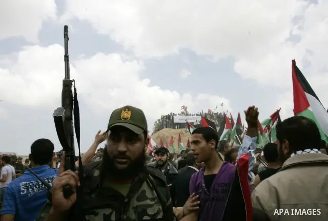 Palestinians rally along the Rafah border terminal between Egypt and the southern Gaza Strip, on May 15, 2011, during a gathering to mark the 63th anniversary of the "Nakba" (catastrophe). Nakba means "catastrophe" in re...