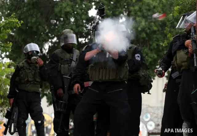 Israeli soldiers fire tear gas canisters during clashes with stone throwers at the Israeli manned Qalandia checkpoint between Jerusalem and the West Bank city of Ramallah on May 15, 2011. Palestinians across the Israeli...