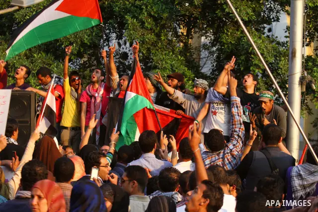 Egyptian protesters take part in a protest in front of the Israeli embassy in Cairo on May 15, 2011 in solidarity with Palestinians who mourned the "nakbah" anniversary of Israel's creation in 1948, as a result of which...