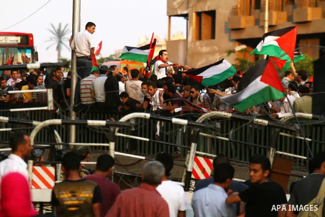 Egyptian protesters take part in a protest in front of the Israeli embassy in Cairo on May 15, 2011 in solidarity with Palestinians who mourned the "nakbah" anniversary of Israel's creation in 1948, as a result of which...