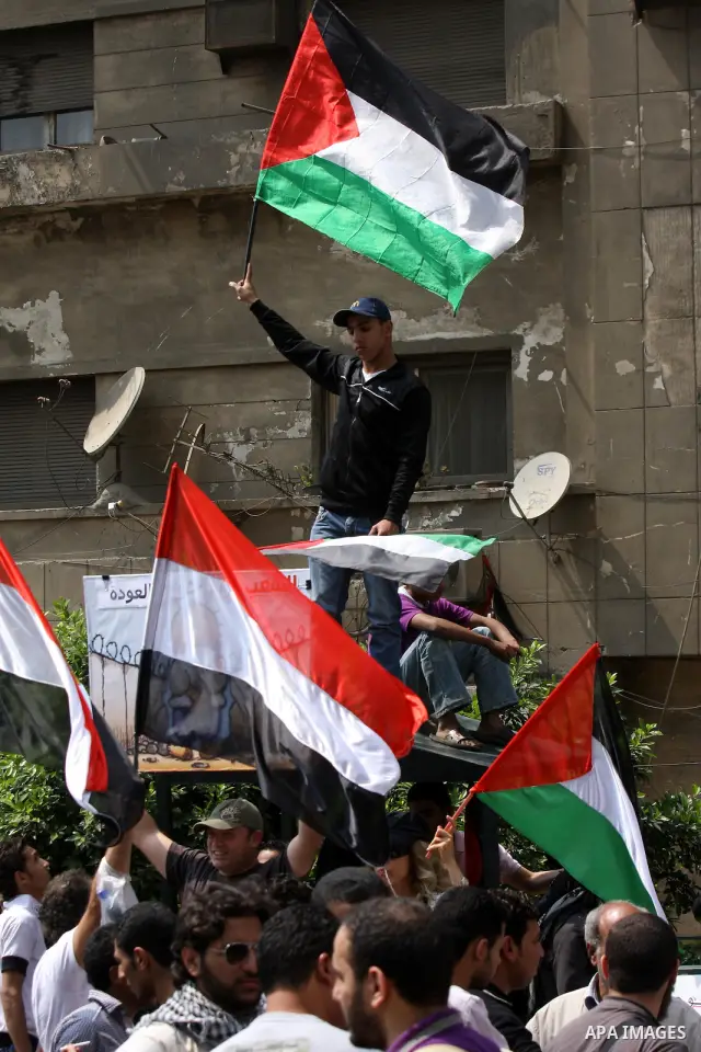 Egyptian protesters take part in a protest in front of the Israeli embassy in Cairo on May 15, 2011 in solidarity with Palestinians who mourned the "nakbah" anniversary of Israel's creation in 1948, as a result of which...