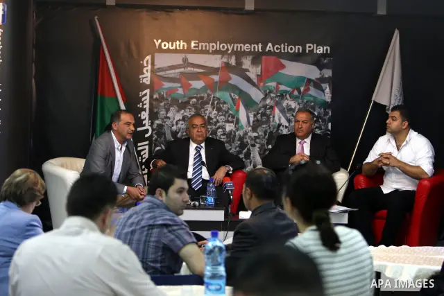 Palestinian Prime Minister, Salam Fayyad attends a ceremony for the launching a plan to work Palestinian youths, in the West Bank city of Ramallah on May 16, 2011. Photo by Mustafa Abu Dayeh