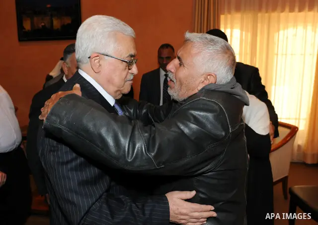 Palestinian President Mahmoud Abbas (Abu Mazen) meets the family of the martyr Aya Baratha'a at his office in the biblical town of Bethlehem on May 16, 2011. Photo by Thaer Ganaim