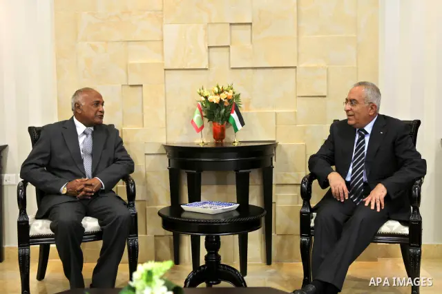 Palestinian Prime Minister, Salam Fayyad during his meeting on May 17, 2011 with Minister of Foreign Affairs for Republic of Maldives, Ahmed Naseem in the west bank city of Ramallah. Photo by Mustafa Abu Dayeh
