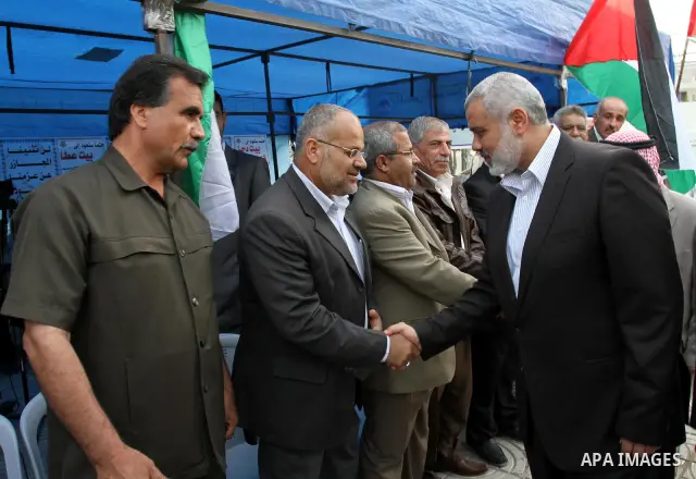 Palestinian Prime Minister in Gaza Strip, Ismail Haniya visits in Gaza city on May 17,2011 the condolences tent for the martyrs killed in the border between Syria, Lebanon and Israel during rallies to mark 63rd anniversa...