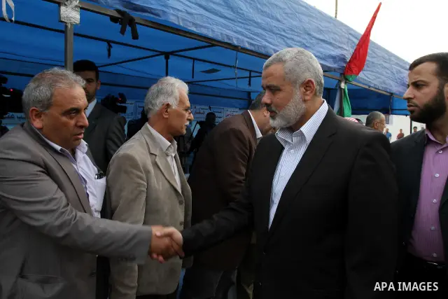 Palestinian Prime Minister in Gaza Strip, Ismail Haniya visits in Gaza city on May 17,2011 the condolences tent for the martyrs killed in the border between Syria, Lebanon and Israel during rallies to mark 63rd anniversa...