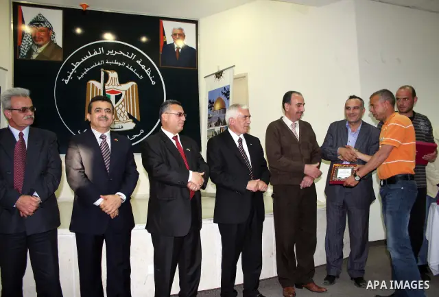 Palestinian Hebron governor, Kamel Hamed honors journalists in occasion of Journalist Day at the Governorate of Hebron in the West Bank city of Hebron,on May18, 2011. Photo by Najeh Hashlamoun .
