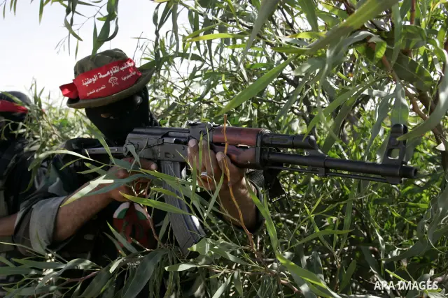 Militants with the Democratic Front for the Liberation of Palestine (DFLP) take part in a military training session in the southern Gaza Strip town of Khan Yunis on May 19, 2011. Photo by Abed Rahim Khatib