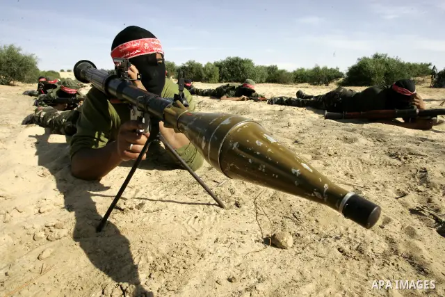 Militants with the Democratic Front for the Liberation of Palestine (DFLP) take part in a military training session in the southern Gaza Strip town of Khan Yunis on May 19, 2011. Photo by Abed Rahim Khatib