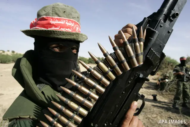 Militants with the Democratic Front for the Liberation of Palestine (DFLP) take part in a military training session in the southern Gaza Strip town of Khan Yunis on May 19, 2011. Photo by Abed Rahim Khatib