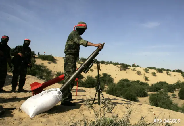 Militants with the Democratic Front for the Liberation of Palestine (DFLP) take part in a military training session in the southern Gaza Strip town of Khan Yunis on May 19, 2011. Photo by Abed Rahim Khatib