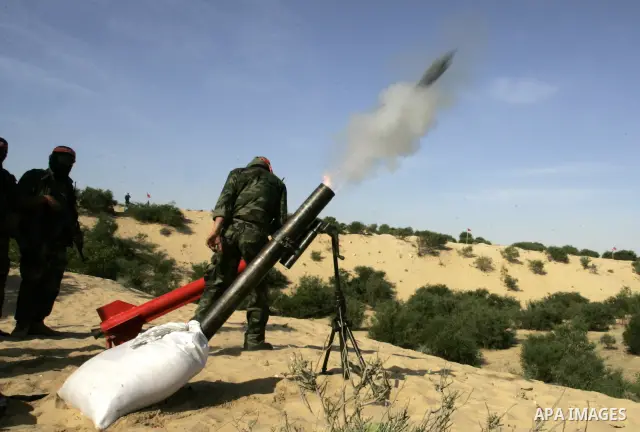 Militants with the Democratic Front for the Liberation of Palestine (DFLP) take part in a military training session in the southern Gaza Strip town of Khan Yunis on May 19, 2011. Photo by Abed Rahim Khatib