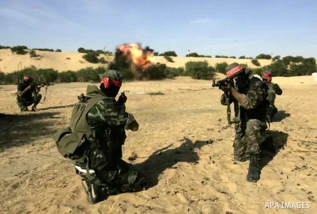 Militants with the Democratic Front for the Liberation of Palestine (DFLP) take part in a military training session in the southern Gaza Strip town of Khan Yunis on May 19, 2011. Photo by Abed Rahim Khatib