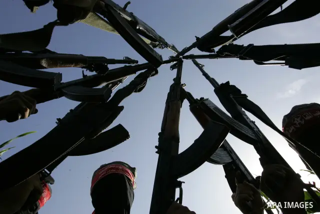 Militants with the Democratic Front for the Liberation of Palestine (DFLP) take part in a military training session in the southern Gaza Strip town of Khan Yunis on May 19, 2011. Photo by Abed Rahim Khatib