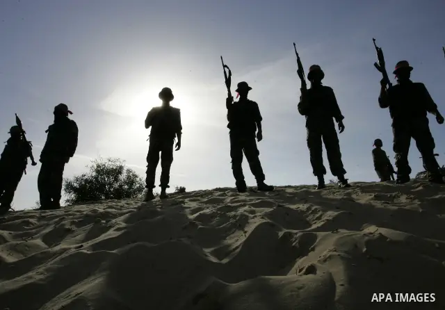 Militants with the Democratic Front for the Liberation of Palestine (DFLP) take part in a military training session in the southern Gaza Strip town of Khan Yunis on May 19, 2011. Photo by Abed Rahim Khatib