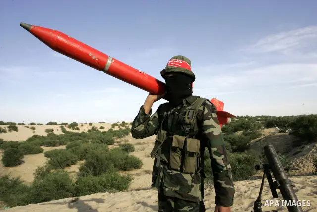 Militants with the Democratic Front for the Liberation of Palestine (DFLP) take part in a military training session in the southern Gaza Strip town of Khan Yunis on May 19, 2011. Photo by Abed Rahim Khatib