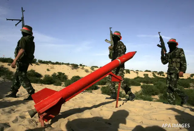 Militants with the Democratic Front for the Liberation of Palestine (DFLP) take part in a military training session in the southern Gaza Strip town of Khan Yunis on May 19, 2011. Photo by Abed Rahim Khatib