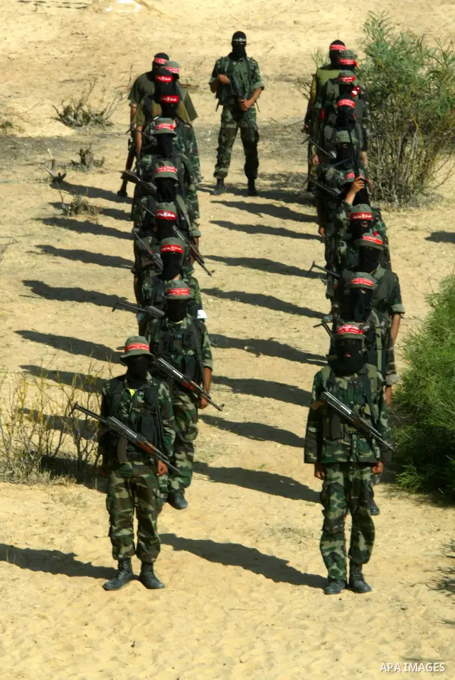 Militants with the Democratic Front for the Liberation of Palestine (DFLP) take part in a military training session in the southern Gaza Strip town of Khan Yunis on May 19, 2011. Photo by Abed Rahim Khatib