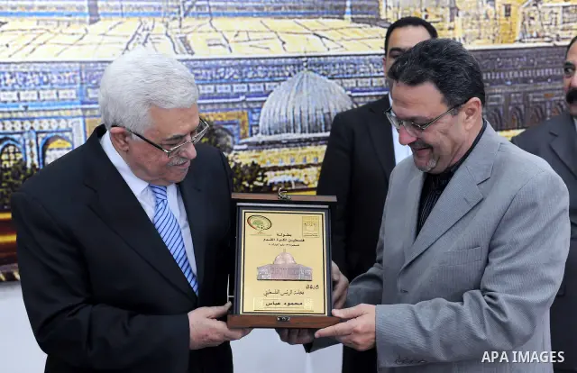 Palestinian President Mahmoud Abbas (Abu Mazen) during a meeting with sports media delegation and Albaqaa football team in the West Bank city of Ramallah on May 20, 2011. Photo by Thaer Ganaim