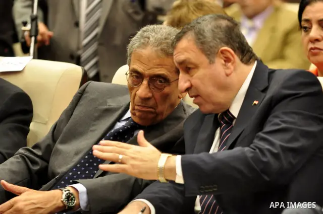 Egyptian Prime Minister, Issam Sharaf and former Secretary-General of the Arab League, Amr Moussa participate in the National Reconciliation Conference in Cairo, Egypt on May 21,2011. Photo by Ahmed Asad