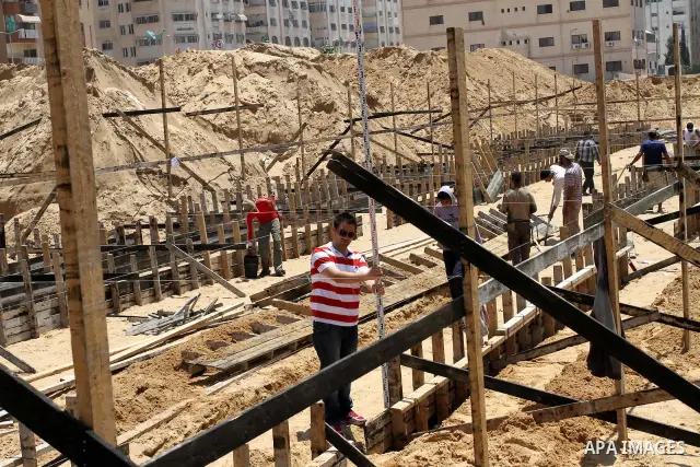 A general view taken on May 22, 2011 shows construction work on two new UN-run schools on the site of the former Palestinian security headquarters in Gaza city which was destroyed by Israel during the 2008-2009 Gaza offe...