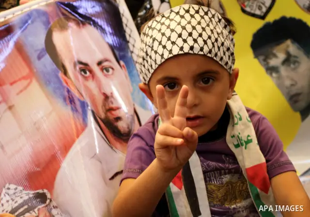 Palestinian children during a rally, at the headquarters of the Red cross calling for the release of Palestinian prisoners from Israeli jails, in Gaza city on May 23, 2011. Photo by Mohammed Asad