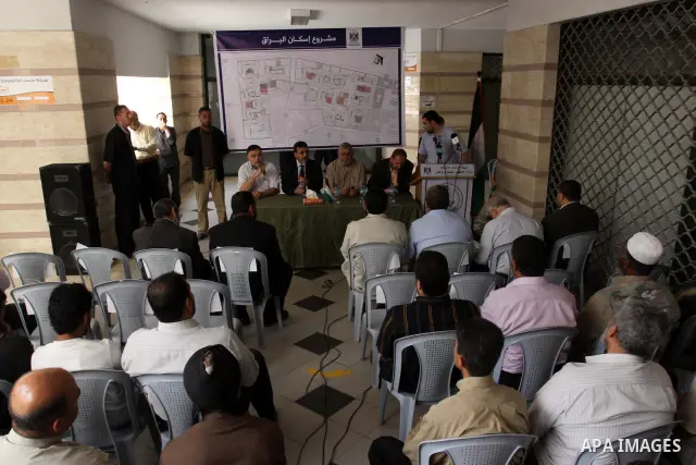 Palestinian members of the Ministry of works and housing attend a press conference to announce the distribution of the governmental lands for citizens in Gaza city on May 25,2011.. Photo by Mohammed Asad