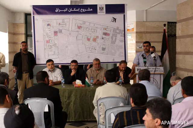 Palestinian members of the Ministry of works and housing attend a press conference to announce the distribution of the governmental lands for citizens in Gaza city on May 25,2011.. Photo by Mohammed Asad