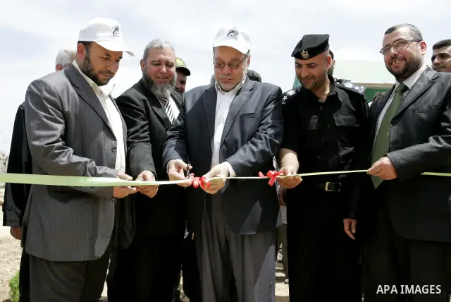 Palestinian tourism and antiquities minister in the Islamist-run government, Mohammed al-Agha attends the openning ceremony of the second stage for searching ancient artifacts recently discovered near the Egyptian border...