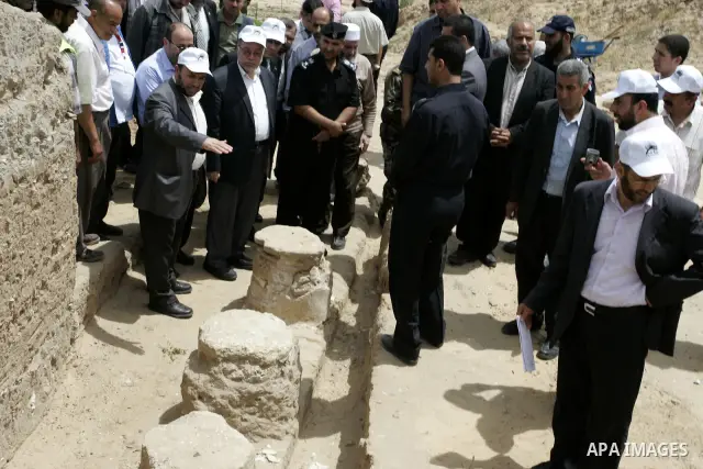 Palestinian tourism and antiquities minister in the Islamist-run government, Mohammed al-Agha attends the openning ceremony of the second stage for searching ancient artifacts recently discovered near the Egyptian border...