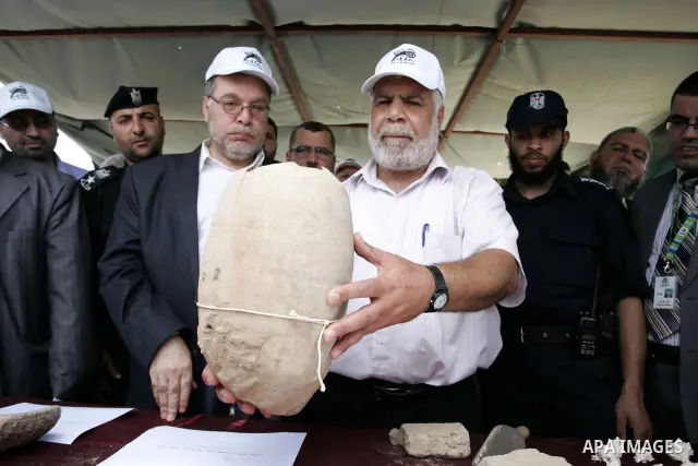 Palestinian tourism and antiquities minister in the Islamist-run government, Mohammed al-Agha attends the openning ceremony of the second stage for searching ancient artifacts recently discovered near the Egyptian border...