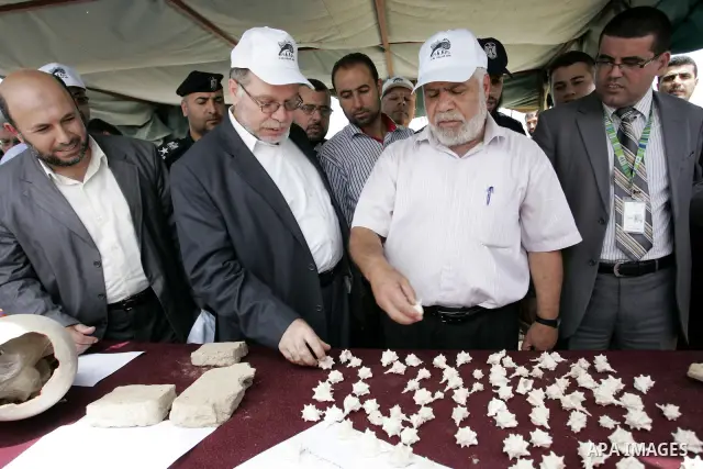Palestinian tourism and antiquities minister in the Islamist-run government, Mohammed al-Agha attends the openning ceremony of the second stage for searching ancient artifacts recently discovered near the Egyptian border...