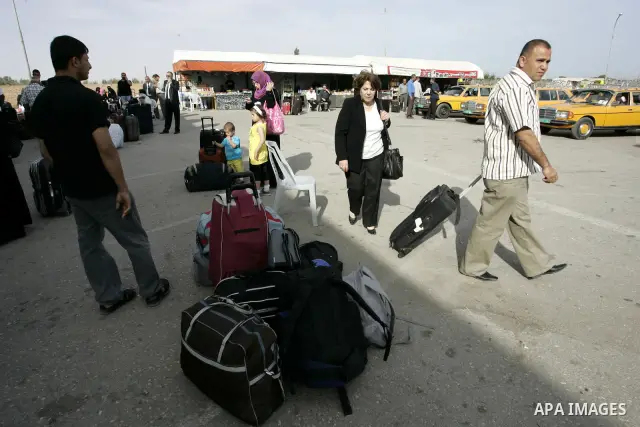 Palestinians wait to cross into Egypt through the Rafah border terminal in the southern Gaza Strip on May 26, 2011, a day after the official MENA news agency reported that Egypt will open the crossing on a daily basis st...
