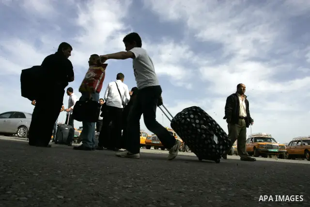 Palestinians wait to cross into Egypt through the Rafah border terminal in the southern Gaza Strip on May 26, 2011, a day after the official MENA news agency reported that Egypt will open the crossing on a daily basis st...