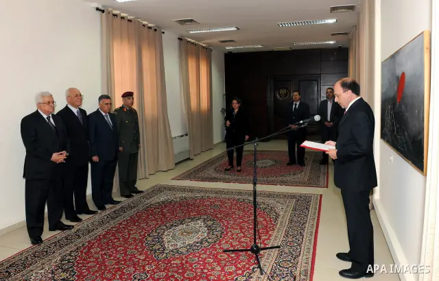 Palestinian President Mahmoud Abbas (Abu Mazen) accepts the credentials of the Representative of Portugal to the Palestinian National Authority, George Miscotti in the west bank city of Ramallah on May 26, 2011 photo by...