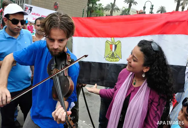 Egyptian protesters take part in a protest at Tahrir Square in Cairo, Egypt Friday, May 27, 2011. Thousands of protesters poured into downtown Cairo's Tahrir Square Friday for what they called a 'second revolution,' stri...
