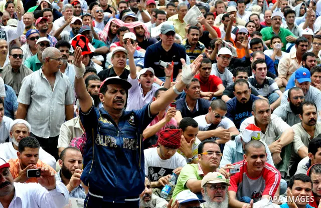 Egyptian protesters take part in a protest at Tahrir Square in Cairo, Egypt Friday, May 27, 2011. Thousands of protesters poured into downtown Cairo's Tahrir Square Friday for what they called a 'second revolution,' stri...