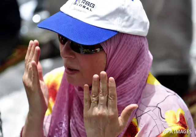 An Egyptian protester attends the weekly Muslim Friday prayers at Tahrir Square in Cairo, Egypt Friday, May 27, 2011. Thousands of protesters poured into downtown Cairo's Tahrir Square Friday for what they called a 'seco...
