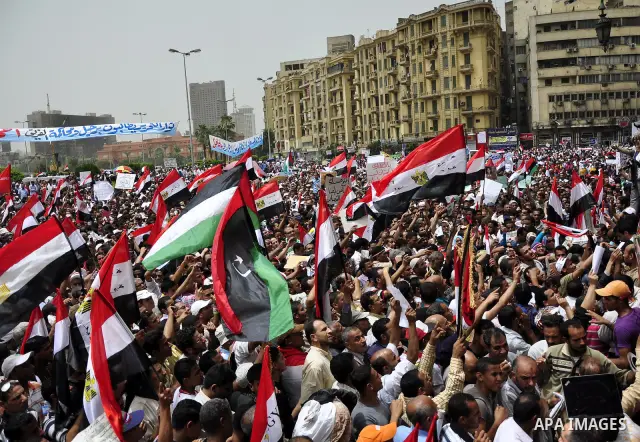 Egyptian protesters take part in a protest at Tahrir Square in Cairo, Egypt Friday, May 27, 2011. Thousands of protesters poured into downtown Cairo's Tahrir Square Friday for what they called a 'second revolution,' stri...