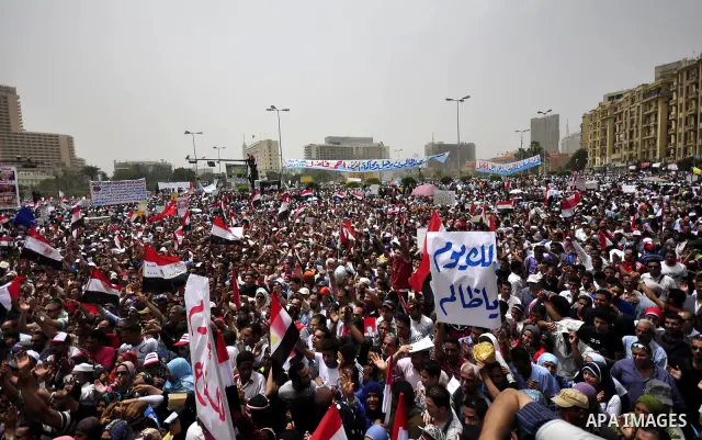 Egyptian protesters take part in a protest at Tahrir Square in Cairo, Egypt Friday, May 27, 2011. Thousands of protesters poured into downtown Cairo's Tahrir Square Friday for what they called a 'second revolution,' stri...