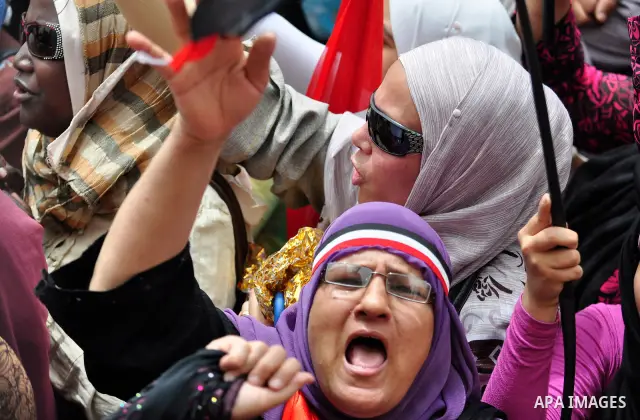 Egyptian protesters take part in a protest at Tahrir Square in Cairo, Egypt Friday, May 27, 2011. Thousands of protesters poured into downtown Cairo's Tahrir Square Friday for what they called a 'second revolution,' stri...