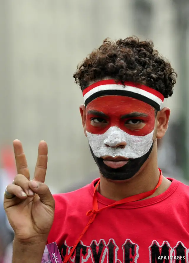 An Egyptian protester takes part in a protest at Tahrir Square in Cairo, Egypt Friday, May 27, 2011. Thousands of protesters poured into downtown Cairo's Tahrir Square Friday for what they called a 'second revolution,' s...