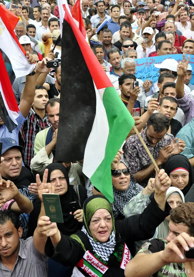 Egyptian protesters take part in a protest at Tahrir Square in Cairo, Egypt Friday, May 27, 2011. Thousands of protesters poured into downtown Cairo's Tahrir Square Friday for what they called a 'second revolution,' stri...