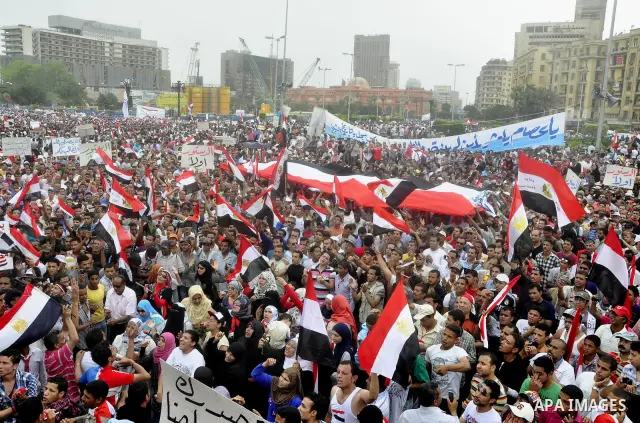 Egyptian protesters take part in a protest at Tahrir Square in Cairo, Egypt Friday, May 27, 2011. Thousands of protesters poured into downtown Cairo's Tahrir Square Friday for what they called a 'second revolution,' stri...