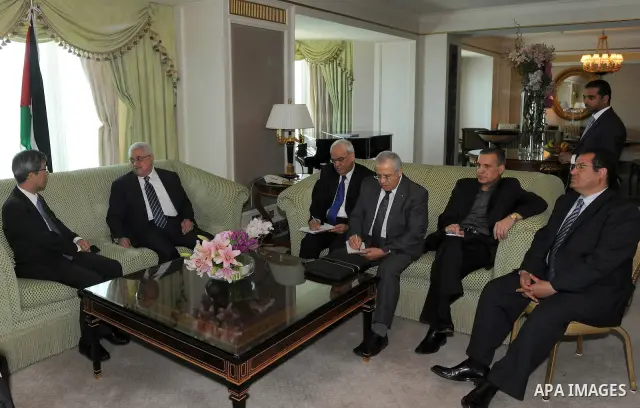 Palestinian President Mahmoud Abbas Abu Mazen) during a meeting with Japan's envoy to the peace process in the Middle East Yutaka Imura in Doha, Qatar on May 28, 2011. Photo by Thaer Ganaim