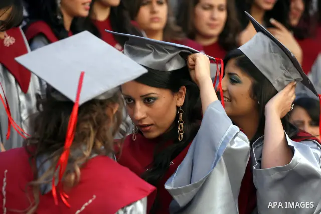 Palestinian students during the graduation ceremony at a "Friends" in the West Bank City of Ramallah, on May 29, 2011. Photo by Issam Rimawi